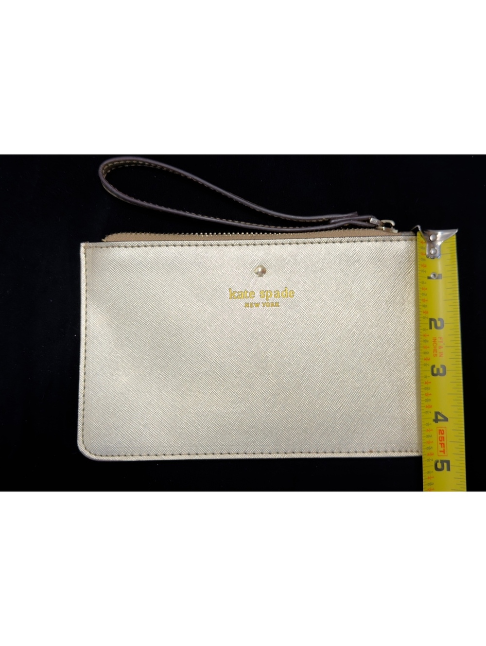 Gold metallic Kate spade wristlet